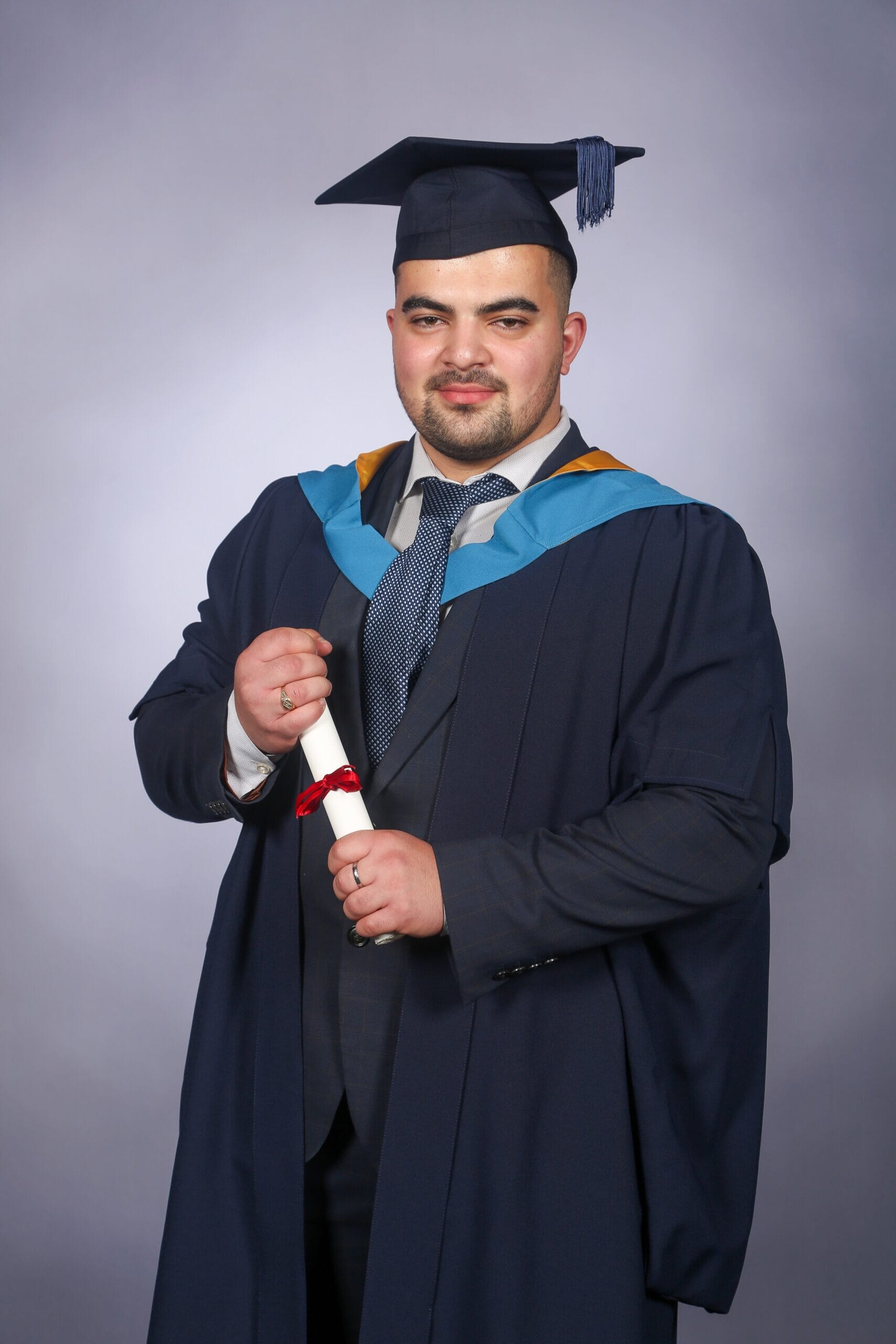 Chris-Thomas-Graduation-scaled.jpg?w=683&h=1024&scale